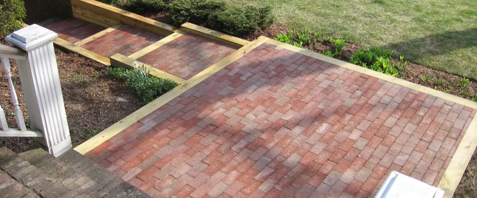 Brick front walk edged with railroad ties